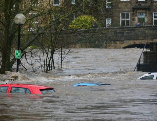 flood prevention fail. Cars in a body of water