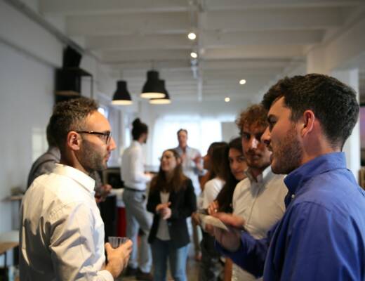 a group of people standing in a room