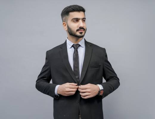 a man in a suit; Patterns Every High-Performing Founder