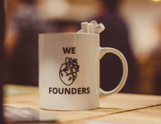 selective focus photo of we Founders heart-printed ceramic mug; Unspoken Rule