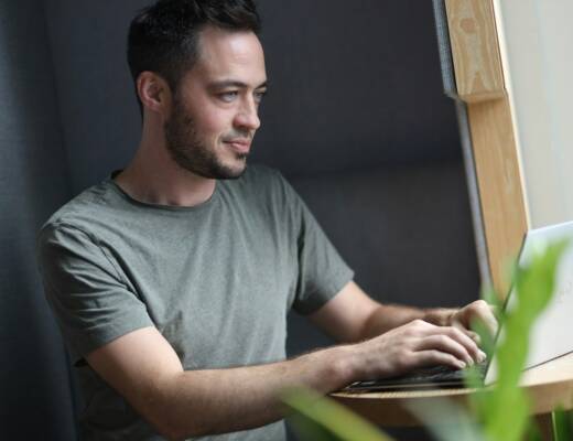 a man using a laptop; founder