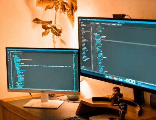 a couple of computer screens; building mvp no-code tools