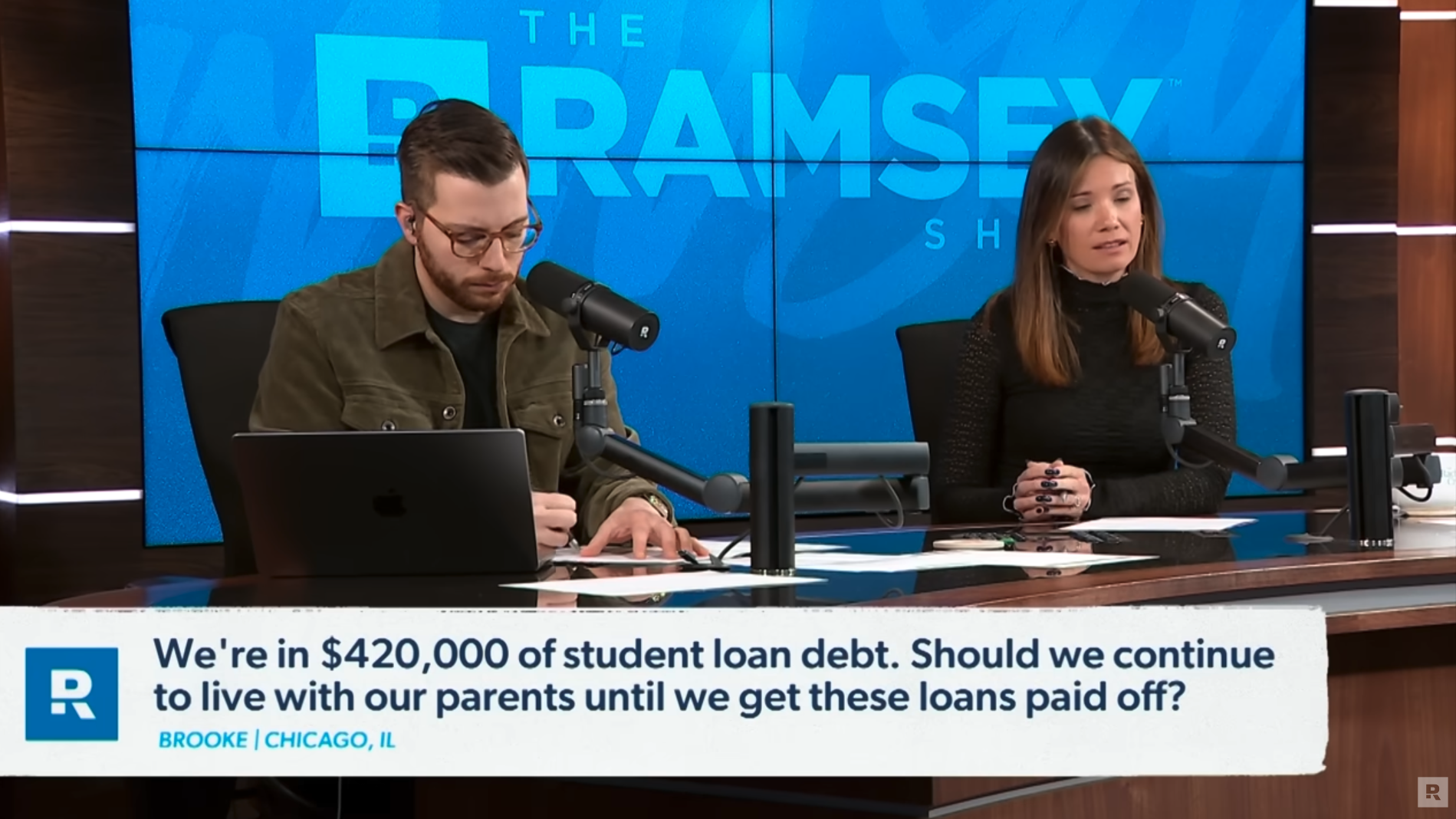 Image of The Ramsey Show Highlights Youtube channel host speaking with talk show guest; kill debt first