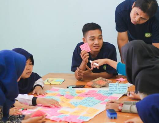 men and women gathered around a table; unspoken fundraising rules
