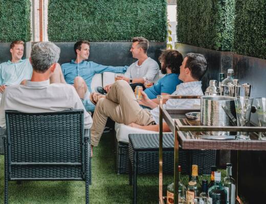 Family hanging out on outdoor patio; adult children need boundaries