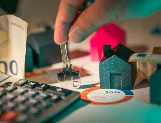 Person calculating property finance; family property deals