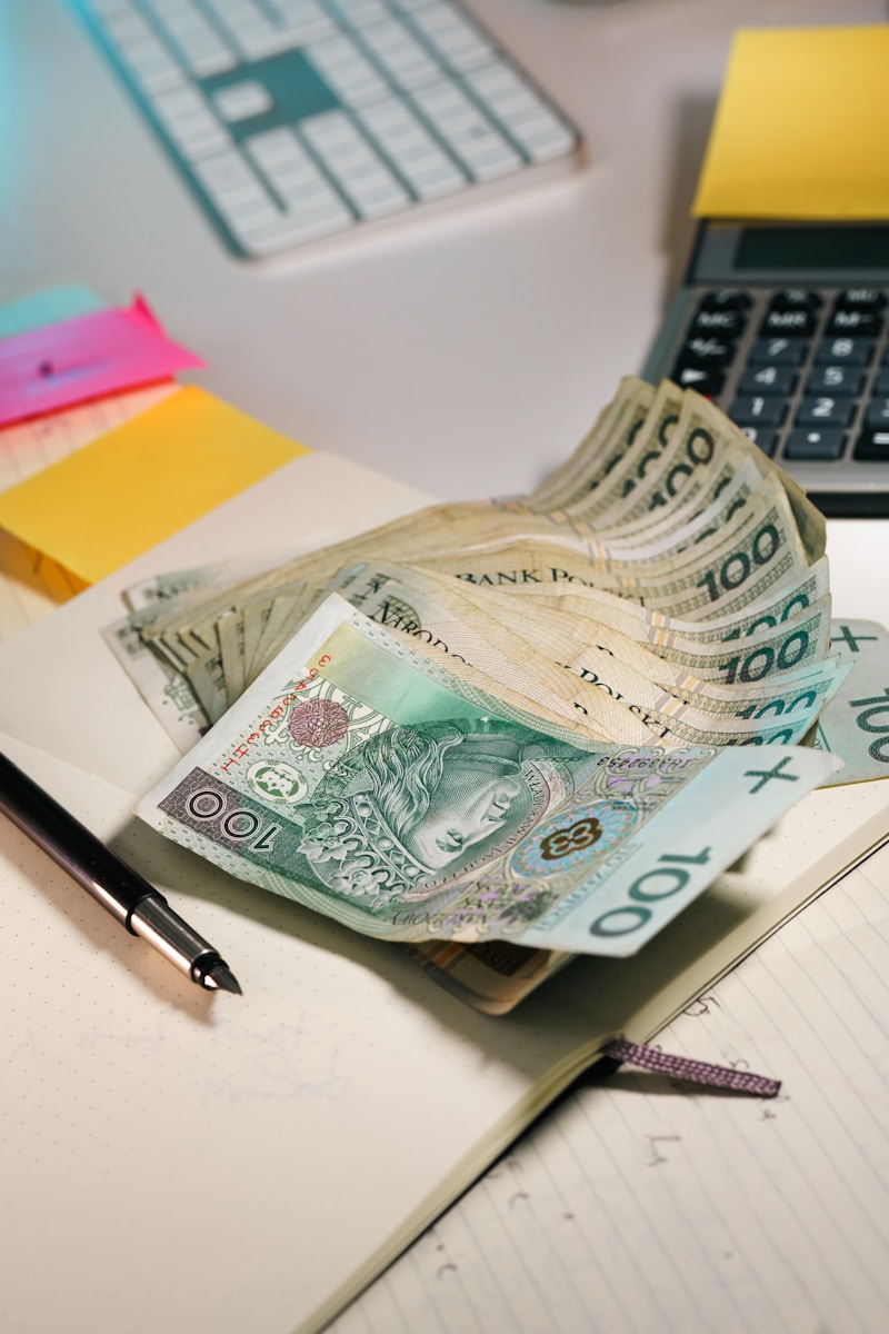 Cash laying on desk as though it's being counted; financial boundaries family guilt