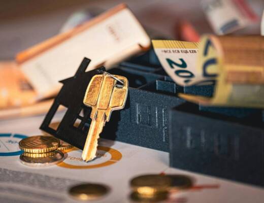 Money and financial planning documents sitting on desk; equity stripping balance sheet