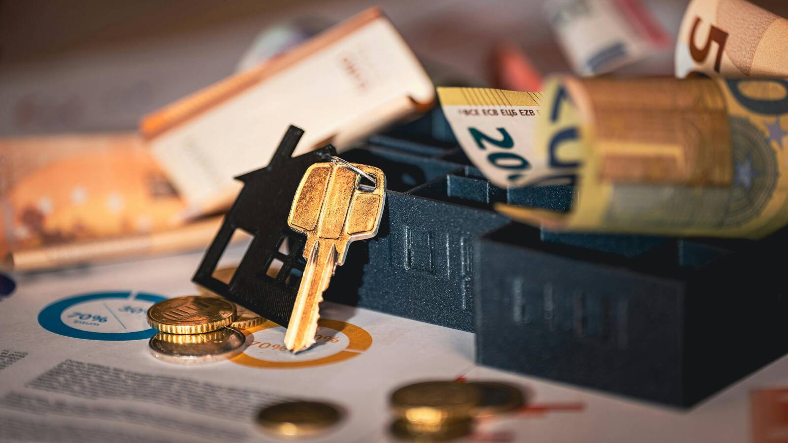 Money and financial planning documents sitting on desk; equity stripping balance sheet