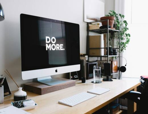 silver iMac with keyboard and trackpad inside room; chasing productivity hacks