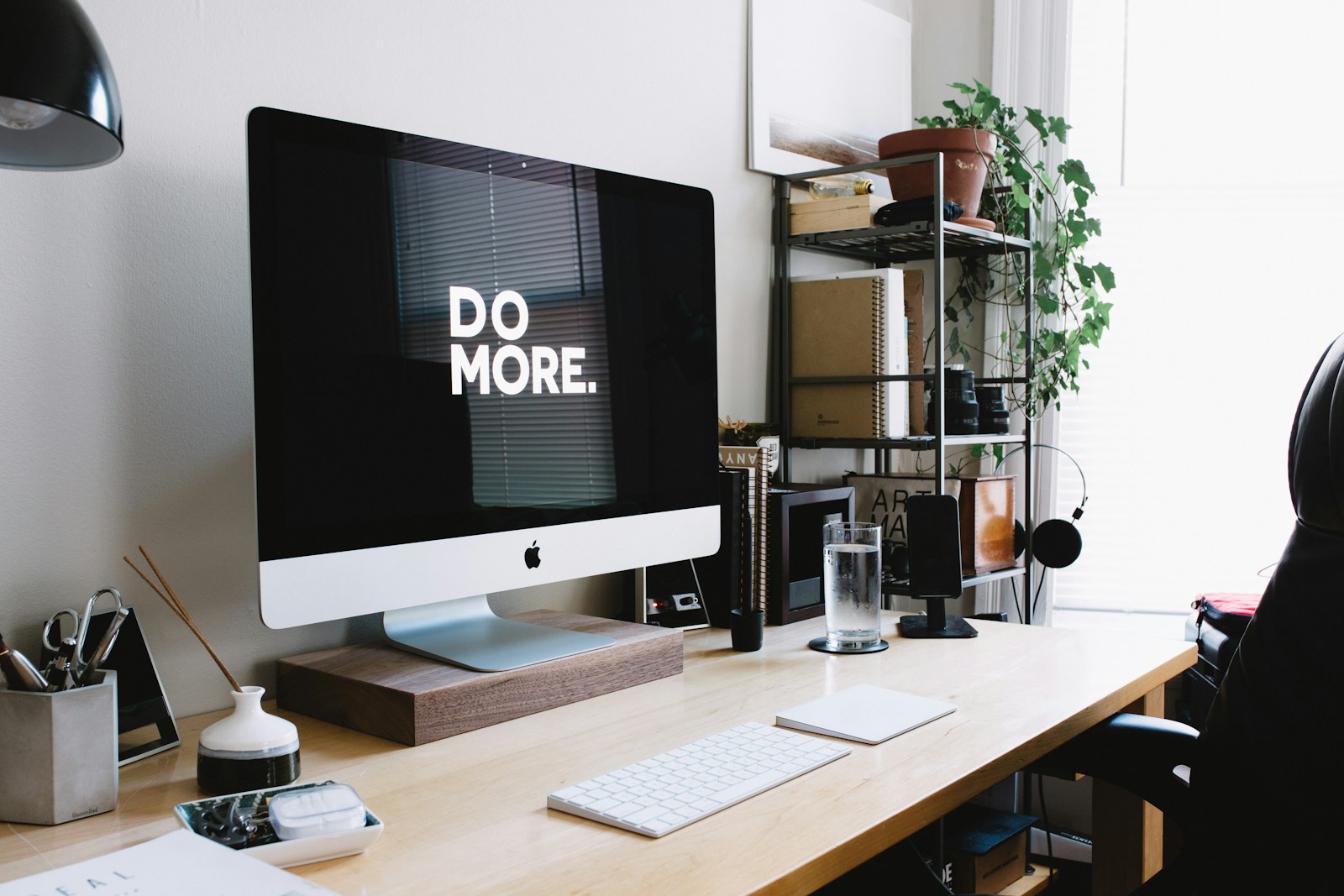 silver iMac with keyboard and trackpad inside room; chasing productivity hacks