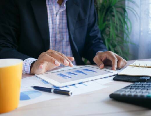 Person calculating family finances; dangerous family finance