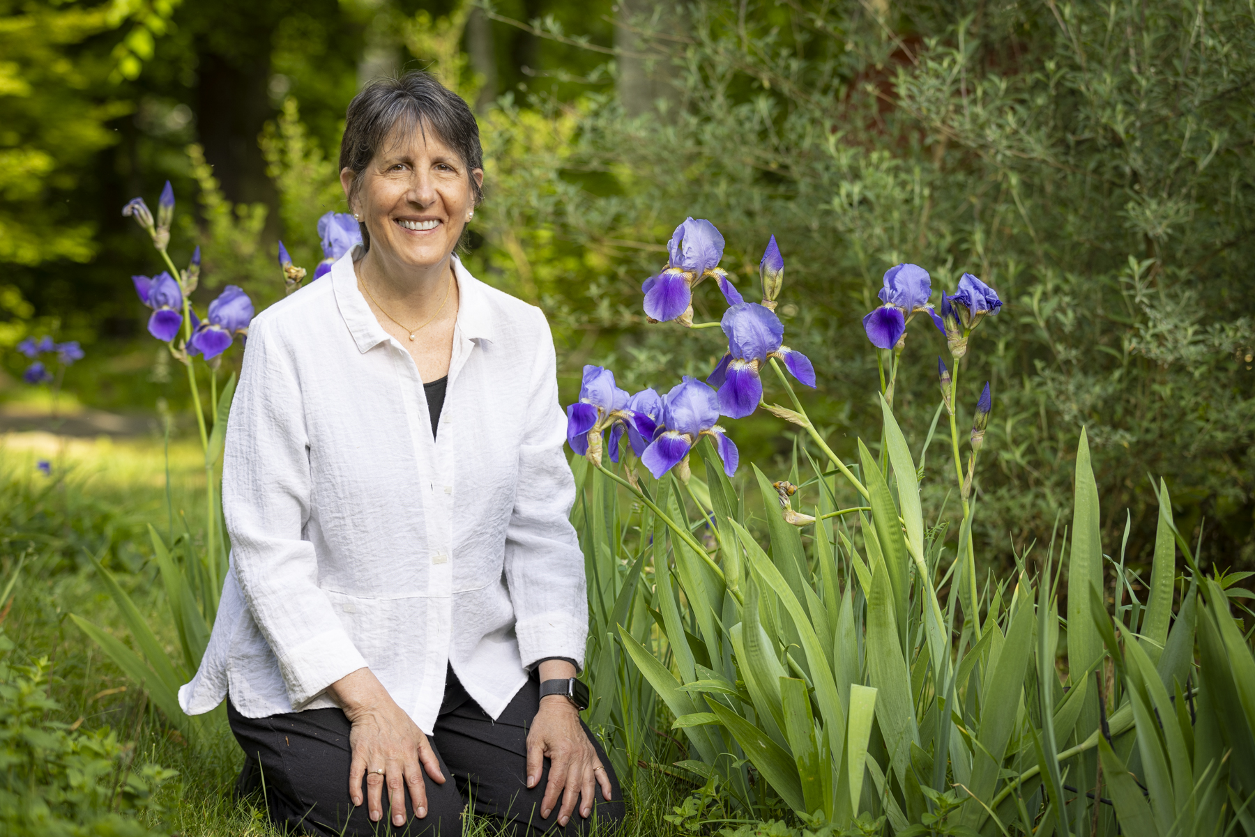Image of Dayna Guido sitting in garden; parenting in AI age